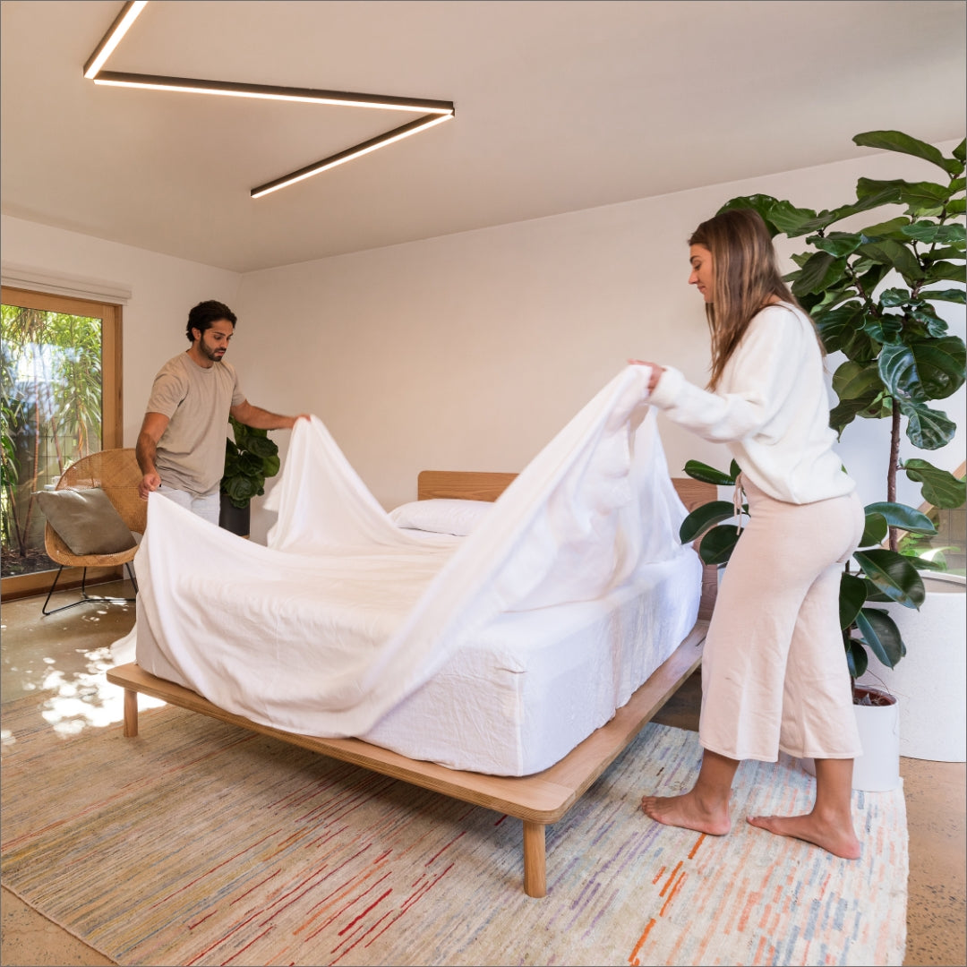 Eva Mattress covered in white linen on top of Eva's Timber Bed Frame | {"option1":["Comfort Classic Mattress"]}